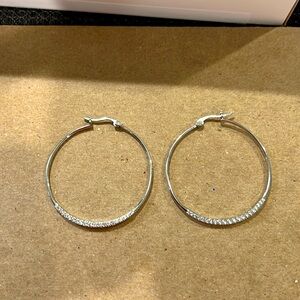 Silver hoop earrings with rhinestones